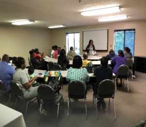 Adults learning in classroom